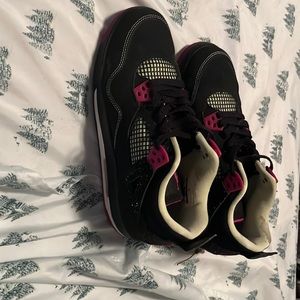 These are Jordan fours, retro PS fuchsias, black,pink, yellow in great condition